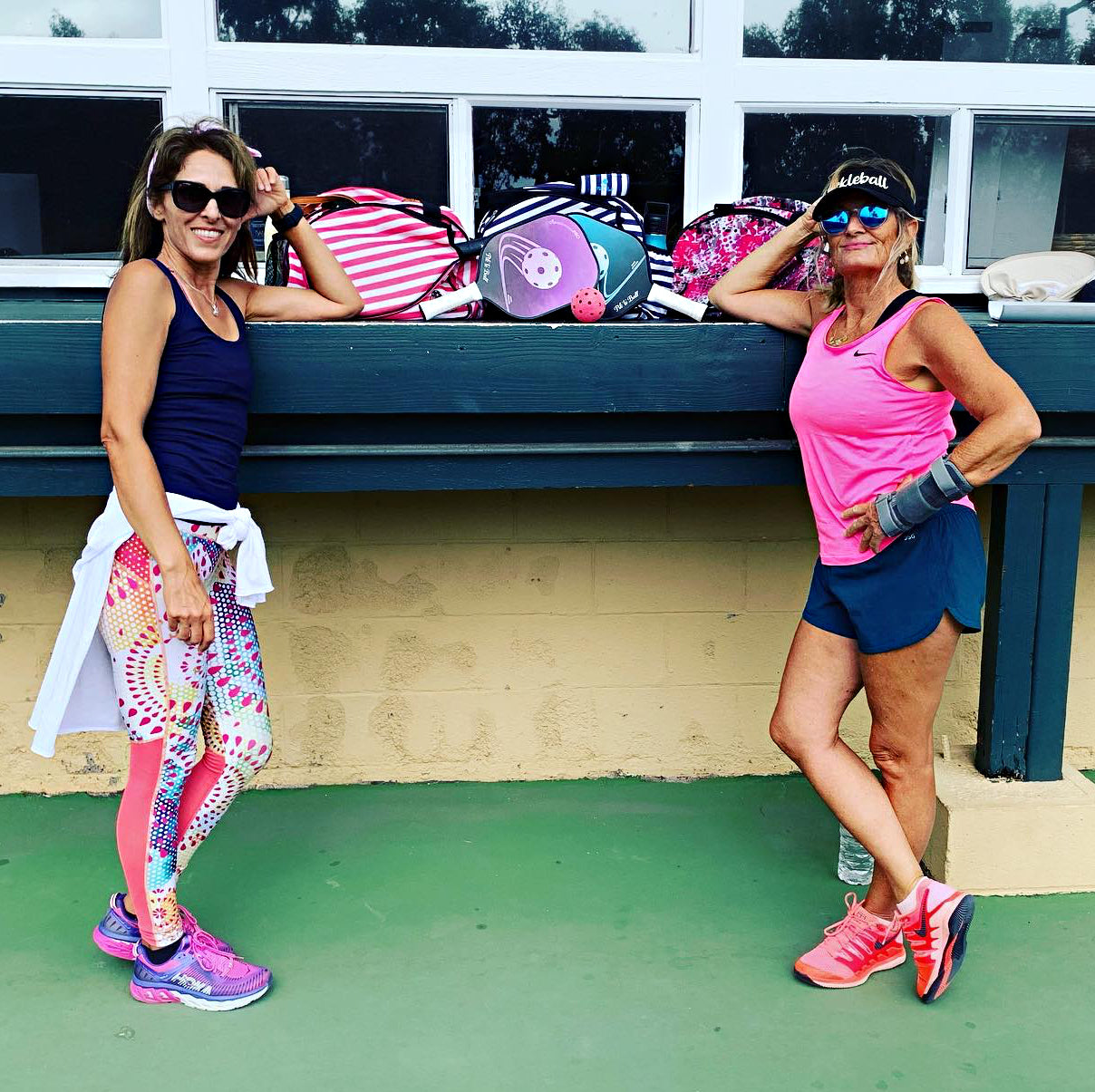 Women pickleball players deciding what are the best bags paddles and fashionable ladies sport tote design